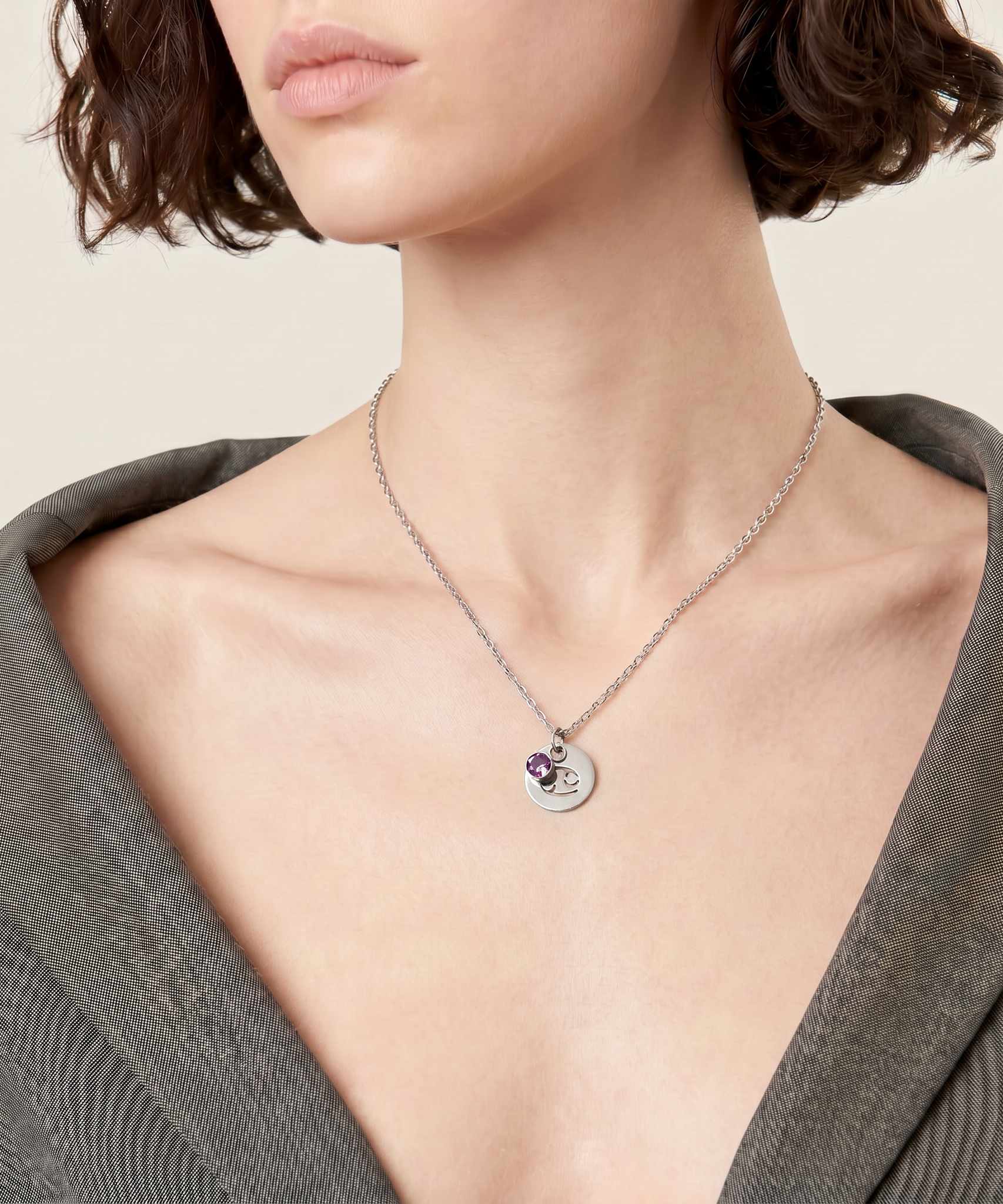 Birthstone necklace of 12 constellations worn by a human model